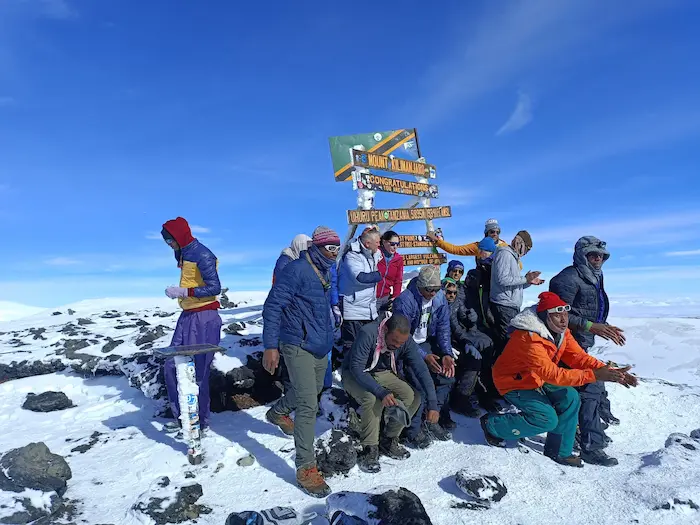 A group at Uhuru peak during Kilimanjaro Lemosho Route Trek - 8 Days
