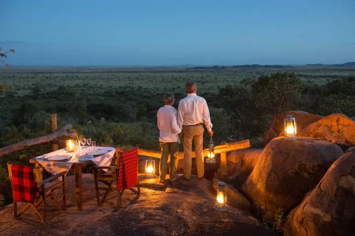 A Couple enjoying during Luxury Tanzania Safari & Zanzibar Honeymoon Packages