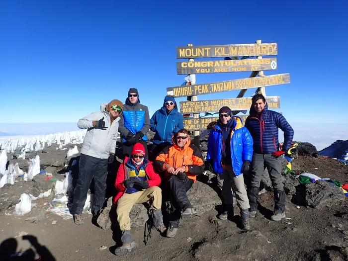 Uhuru Peak sign on Mount Kilimanjaro – the highest point in Africa with panoramic glacier views