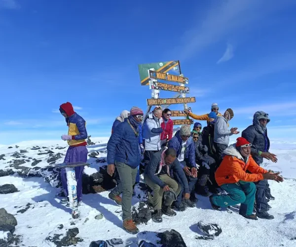 A group at Uhuru peak during Kilimanjaro Lemosho Route Trek - 8 Days