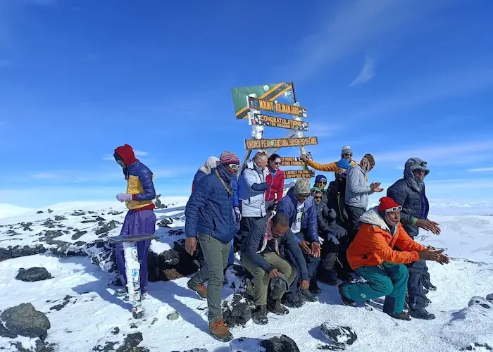 A group at Uhuru peak during Kilimanjaro Lemosho Route Trek - 8 Days