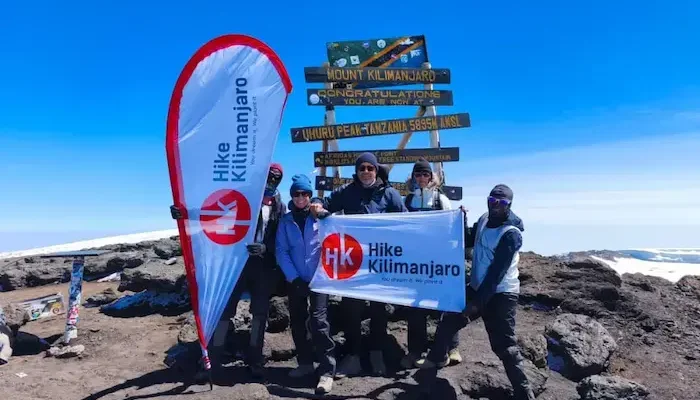 At Uhuru peak during Kilimanjaro Shira Route Hike 7 Days