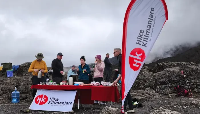 a group at breakfast point during 7-day kilimanjaro group join trek - machame route