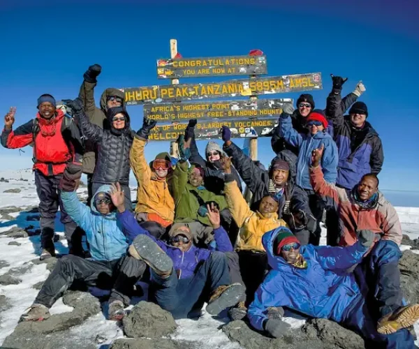 the group at uhuru peak duringKilimanjaro Marangu Route Trek - 6 Days