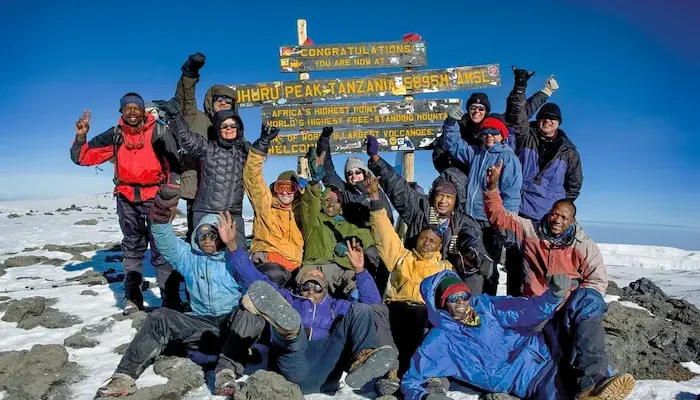 the group at uhuru peak duringKilimanjaro Marangu Route Trek - 6 Days