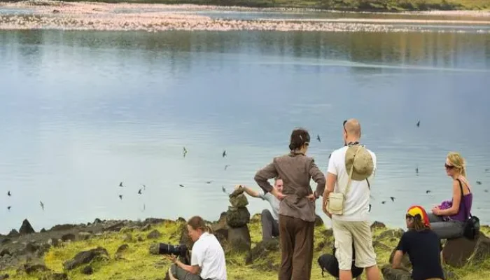 Visitors enjoying scenic views of Lake Momella in Arusha National Park
