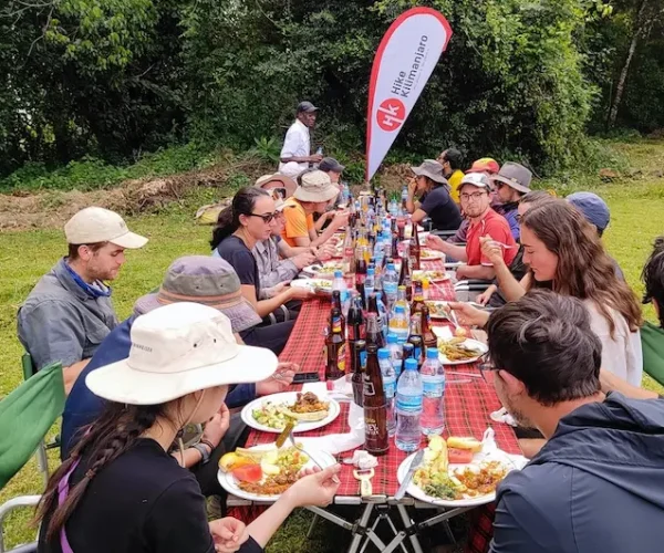 Group having lunch at the gate during 7-Day Kilimanjaro Group Join Trek - Machame Route