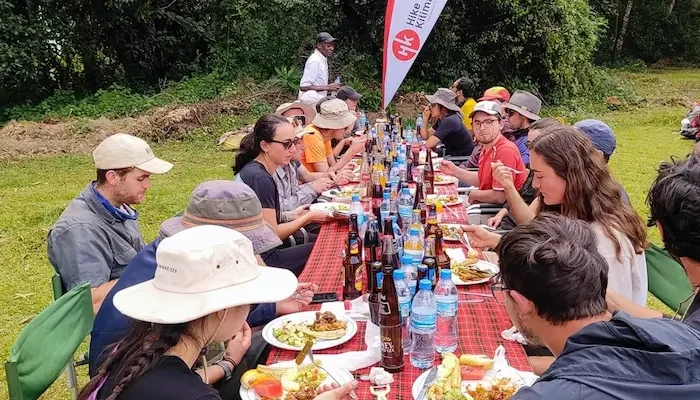Group having lunch at the gate during 7-Day Kilimanjaro Group Join Trek - Machame Route