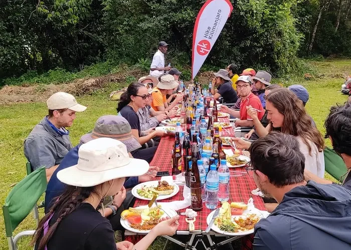Group having lunch at the gate during 7-Day Kilimanjaro Group Join Trek - Machame Route