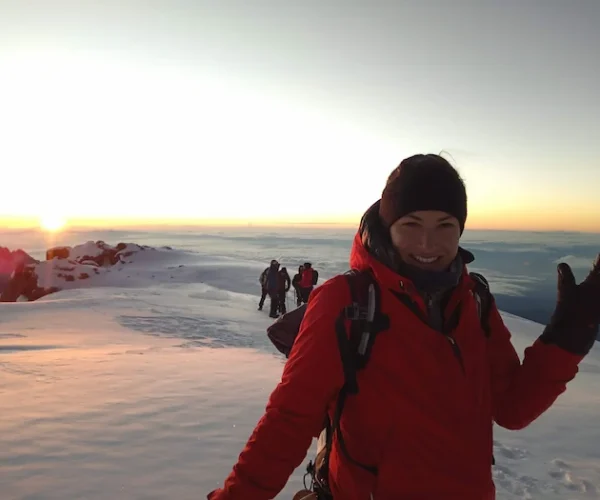 Group summiting Uhuru Peak on the 6-Day Marangu Route – Group Join Trek Kilimanjaro climb